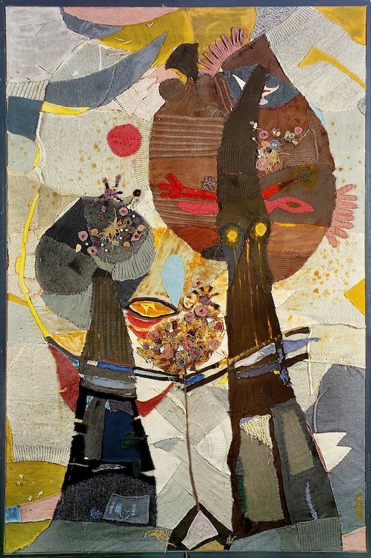 textile collage of two figures clasping a bird