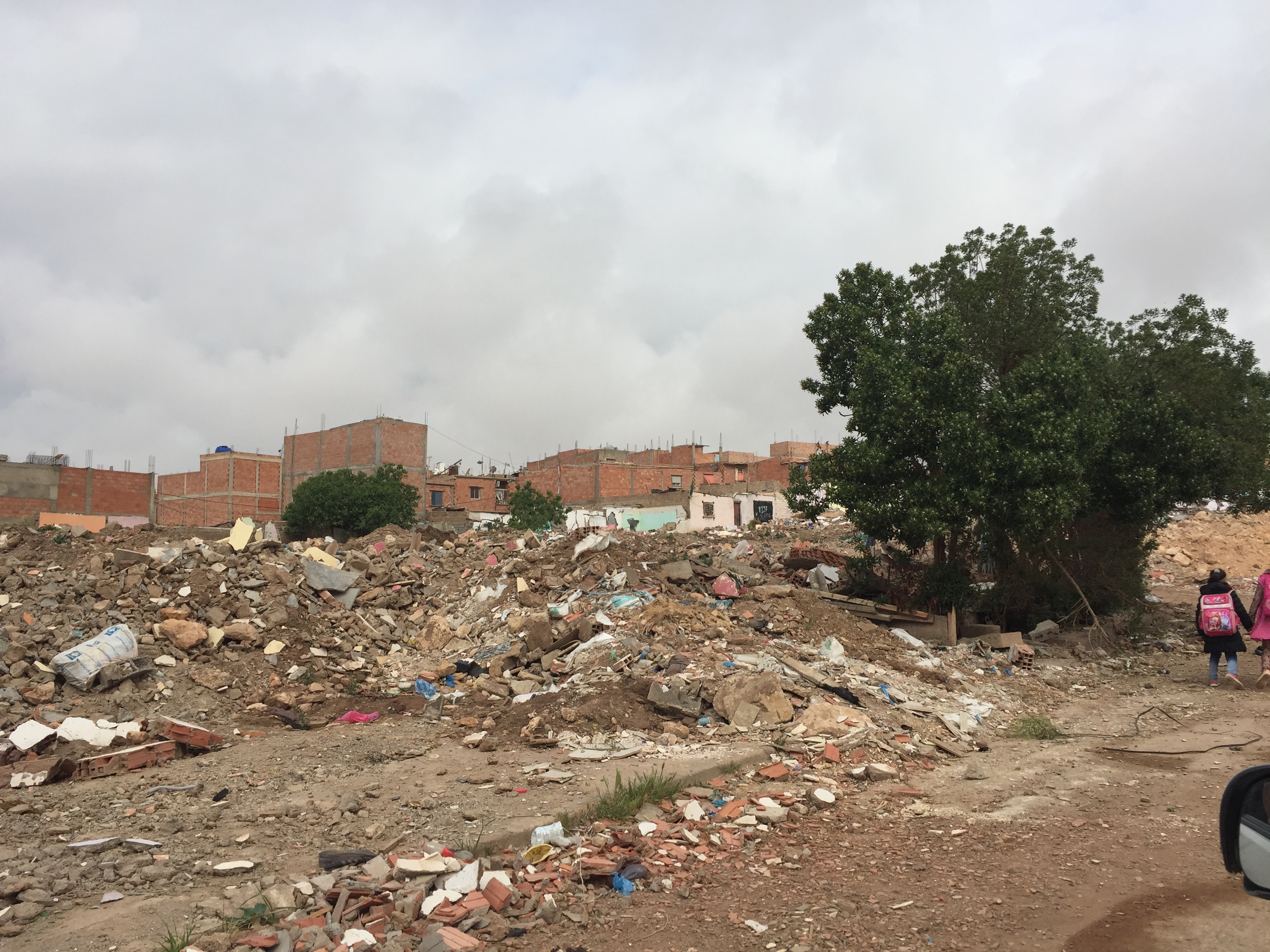 Figure 6. The remains of the shantytown—demolished, but with the debris left in place—outside the gates of the Sidi el-Bachir Cemetery. Photo by author.