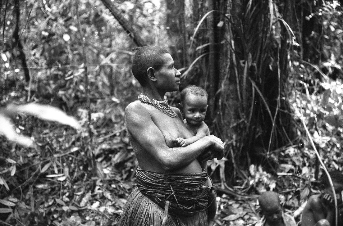 Figure 3. Ulahi and her son Bage in Bosavi, Papua New Guinea, 1977. Photo by Steven Feld.