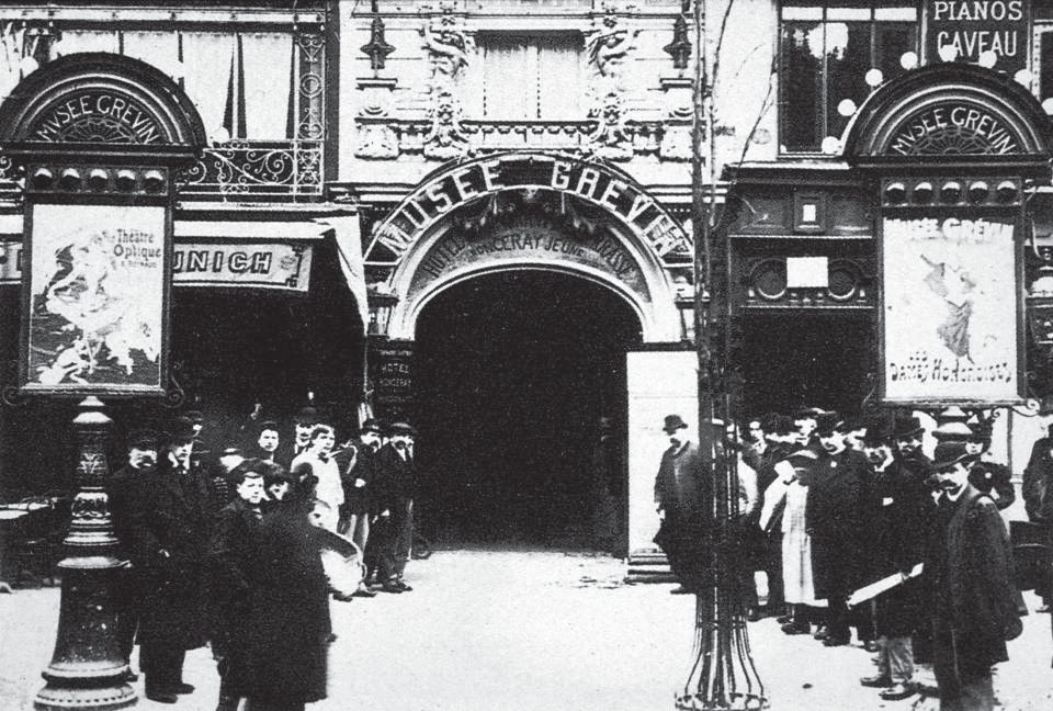 Image 3. EXTERIOR SHOT OF MUSÉE WITH POSTER ON LEFT